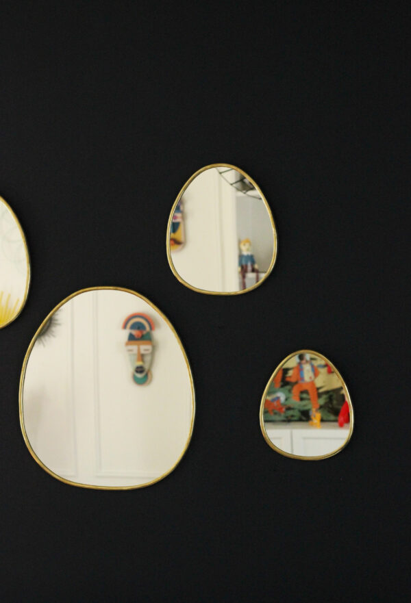 Miroir en laiton fin fabriqué à la main au Maroc travail artisanal modèle galet
